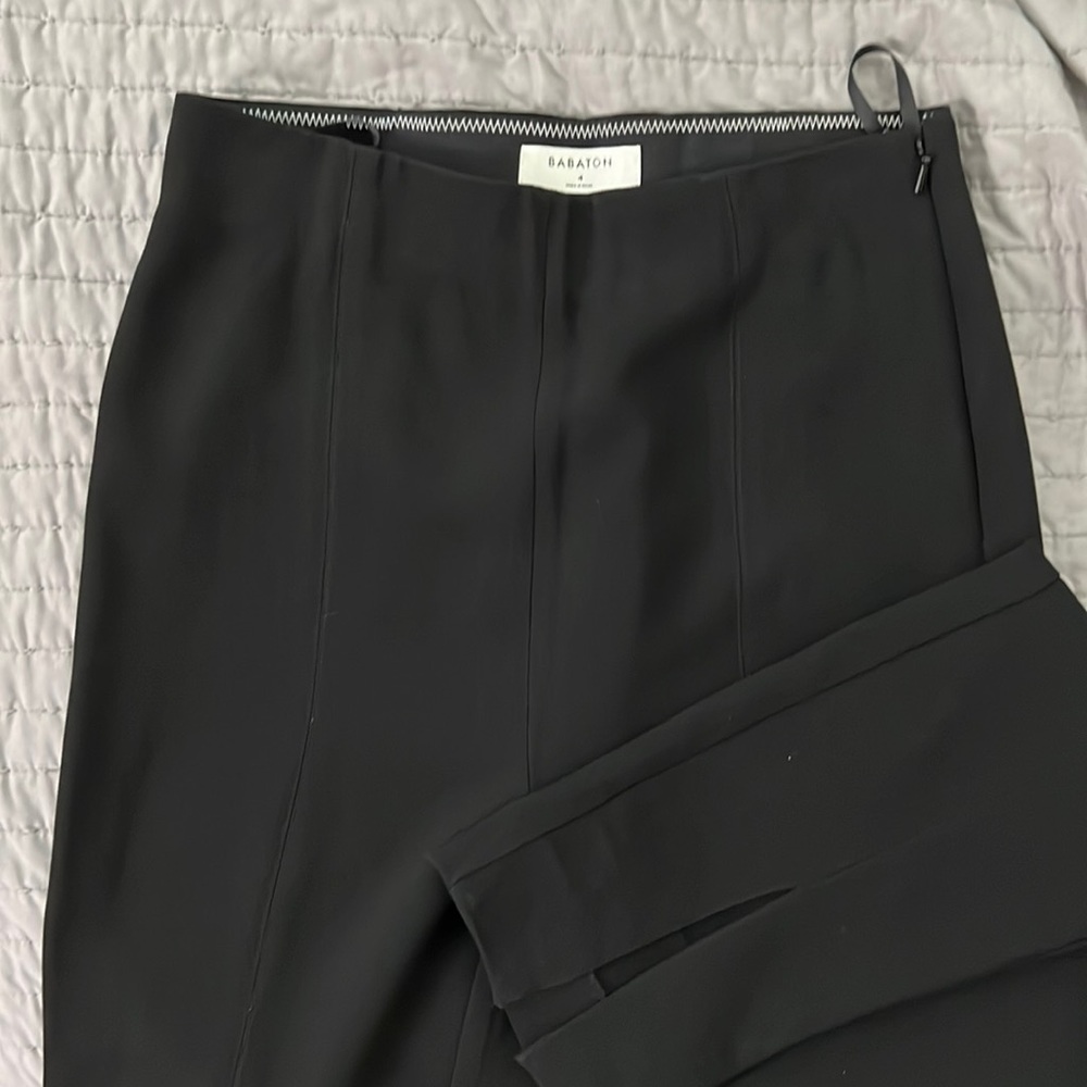 Aritzia Babaton pants with front slits.